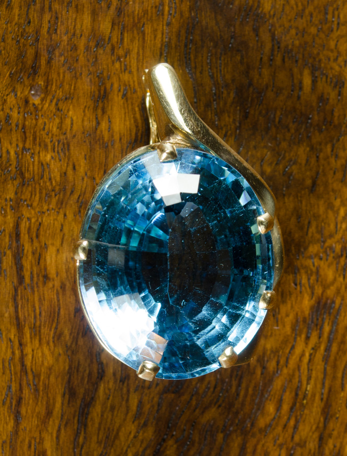 Appraisal: BLUE TOPAZ AND FOURTEEN KARAT GOLD PENDANT with PGL appraisal