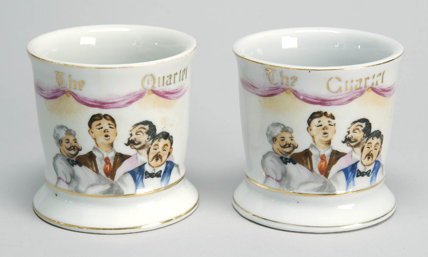 Appraisal: PAIR OF OCCUPATIONAL PORCELAIN SHAVING MUGS Both titled The Quartet