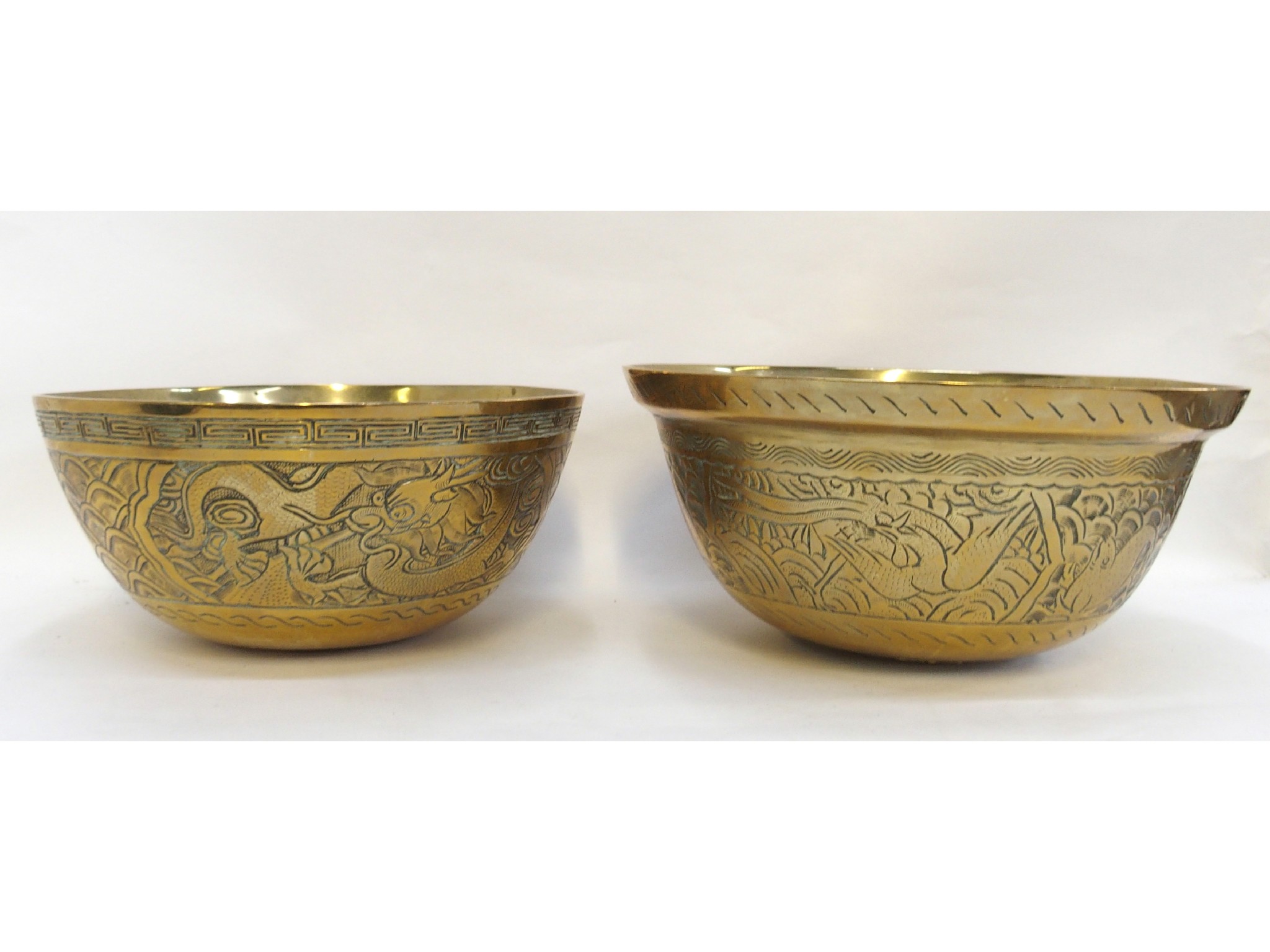 Appraisal: Two Chinese brass bowls with incised decoration