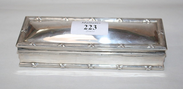 Appraisal: AN EDWARDIAN SILVER TRINKET BOX rectangular shaped with hinged lid