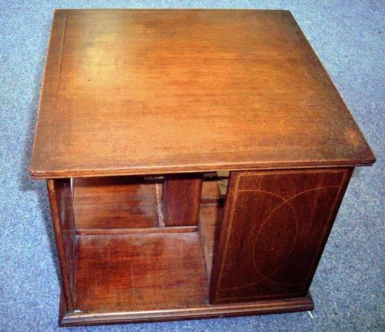 Appraisal: An Edwardian square revolving bookcase inlaid boxwood stringing cm wide