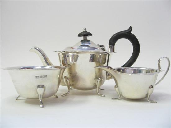 Appraisal: An English Sterling Tea Set a pot with ebonized handle