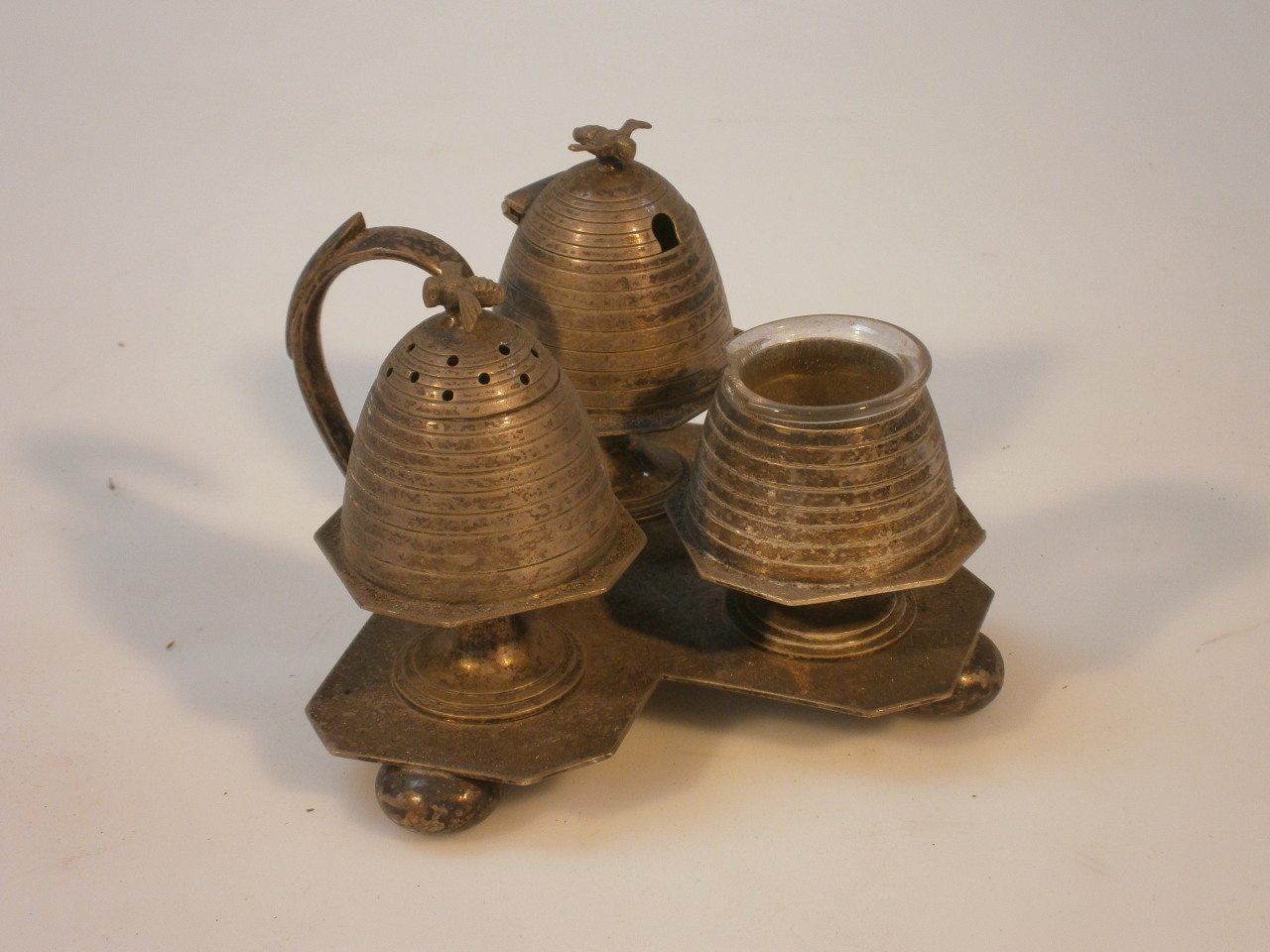 Appraisal: A Victorian novelty cruet each section in the form of