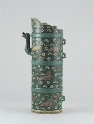 Appraisal: A Chinese famille verte ewer the cylindrical body divided by