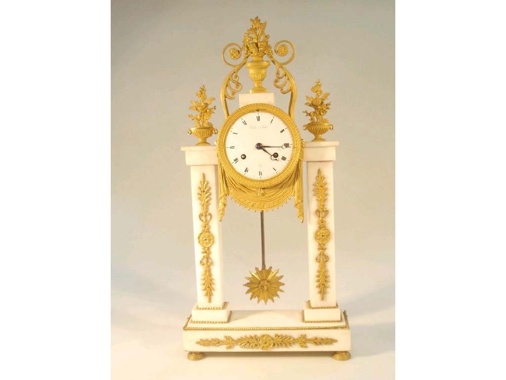 Appraisal: A thC French white marble pediment clock of eight day