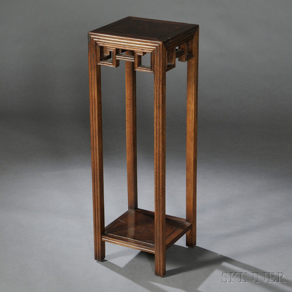 Appraisal: Baker Tall Stand in the Chinese style hardwood burlwood top