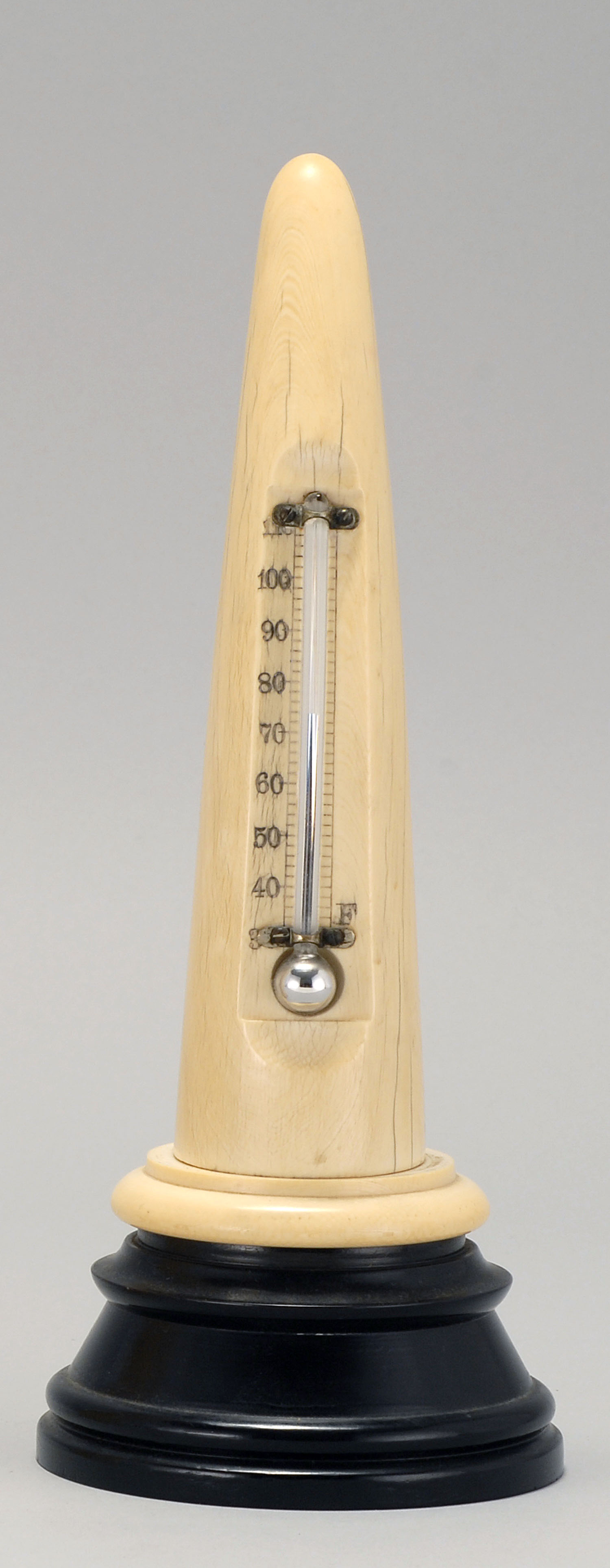 Appraisal: TH CENTURY ELEPHANT TUSK TABLE ORNAMENT with thermometer Mounted to