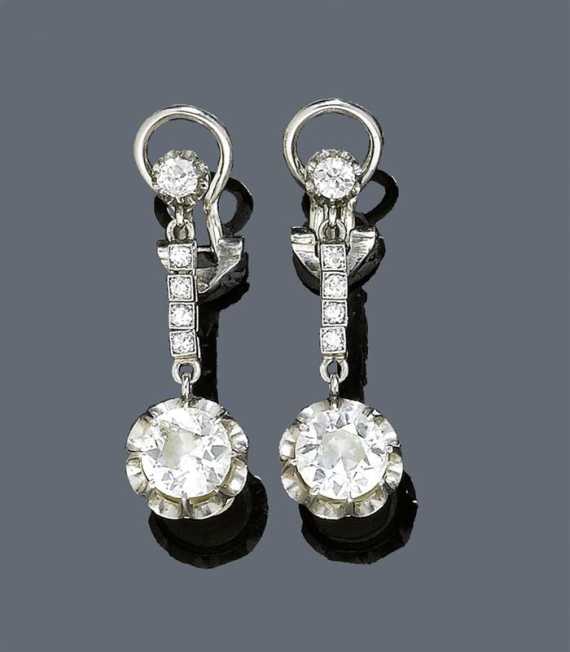 Appraisal: DIAMOND EAR PENDANTS ca Platinum Elegant ear clips each set