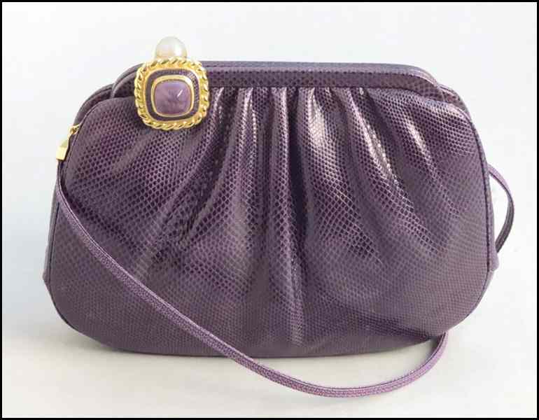 Appraisal: JUDITH LEIBER PURPLE REPTILE SKIN HANDBAG With a faux pearl