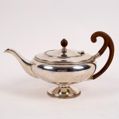 Appraisal: A silver teapot JR Sheffield of circular form with fruitwood