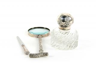 Appraisal: A SILVER MOUNTED CUT GLASS INKWELL A SILVER MOUNTED CUT