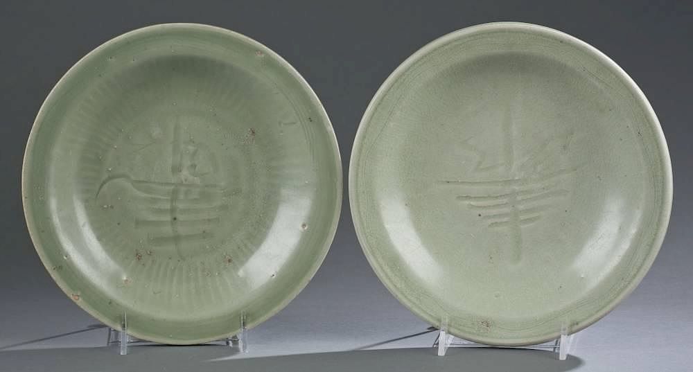 Appraisal: Pair of th C Chinese celadon chargers A Pair of