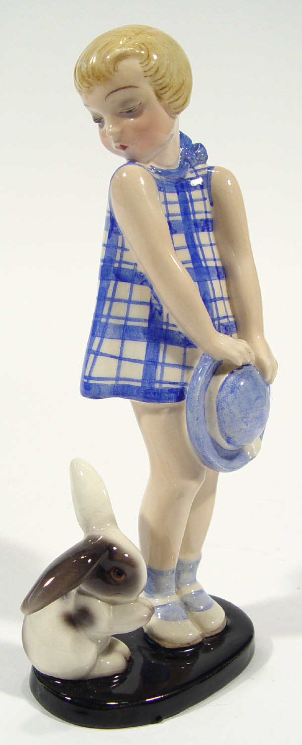 Appraisal: Art Deco Goldschneider pottery figurine in a blue patterned dress