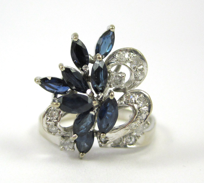 Appraisal: SAPPHIRE DIAMOND AND FOURTEEN KARAT GOLD RING The white gold