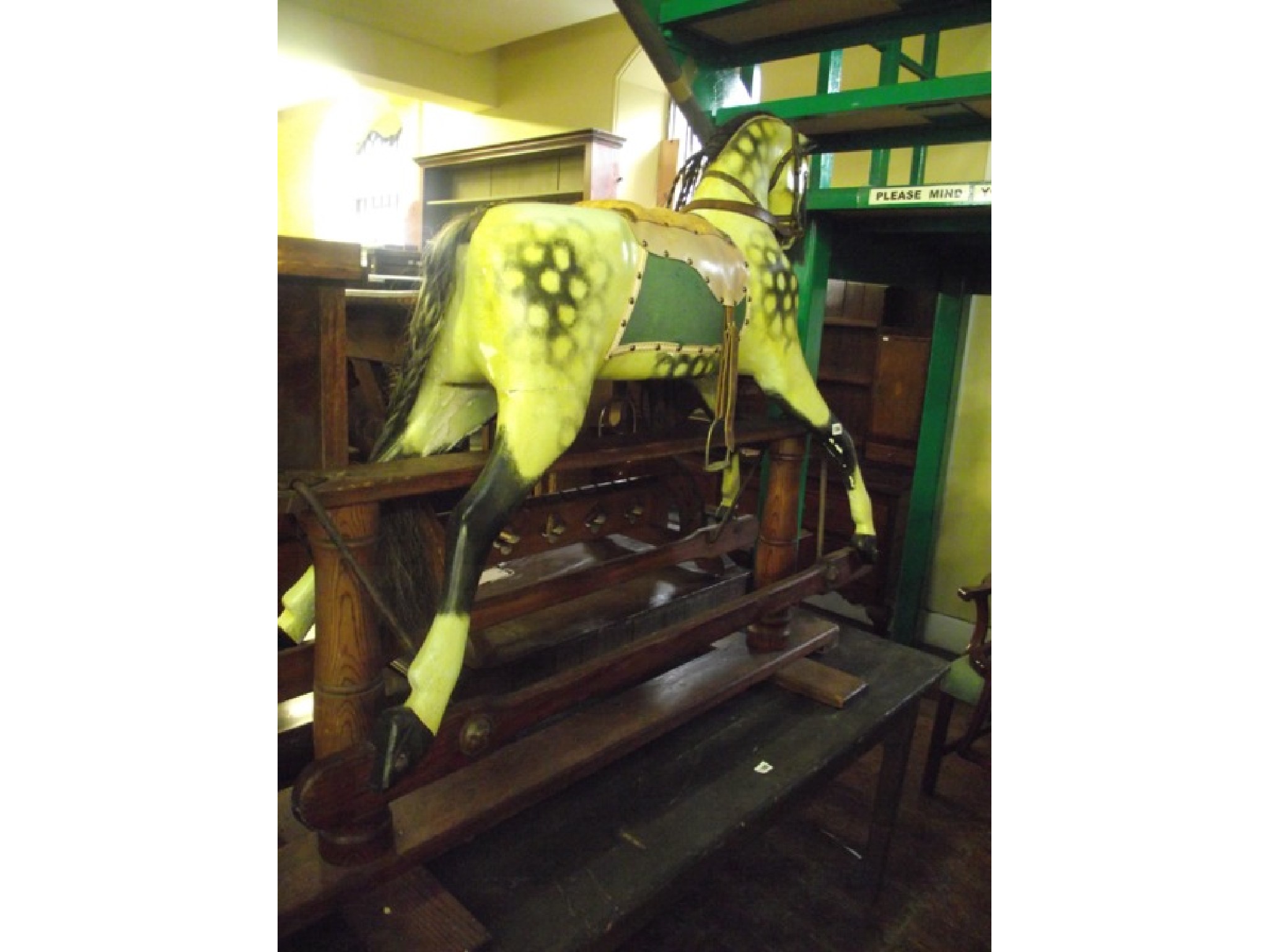 Appraisal: An Edwardian dapple grey rocking horse with painted finish raised