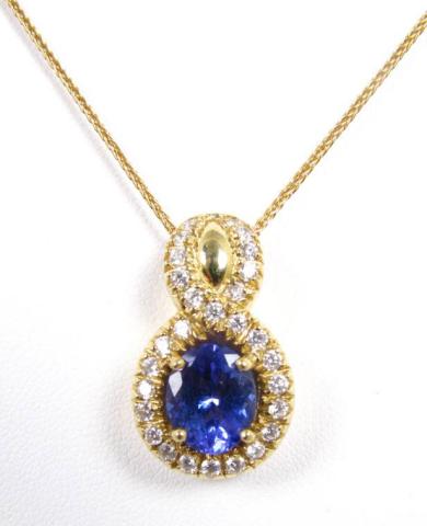 Appraisal: K Yellow Gold Pendant with Oval Cut Tanzanite center stone