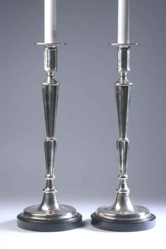 Appraisal: PAIR CONTINENTAL SILVER PLATED CANDLESTICKS th century Circular base rising