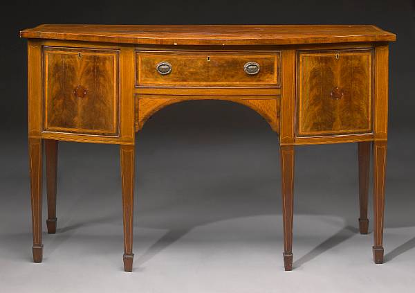 Appraisal: A George III style inlaid mahogany bowfront sideboard second half