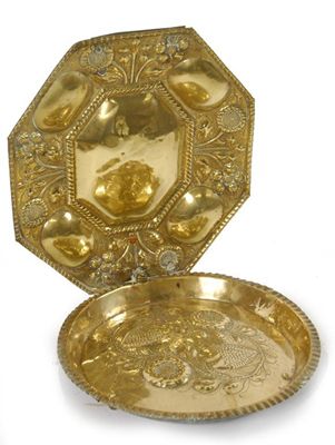 Appraisal: A continental embossed brass reflector of octagonal form previously with