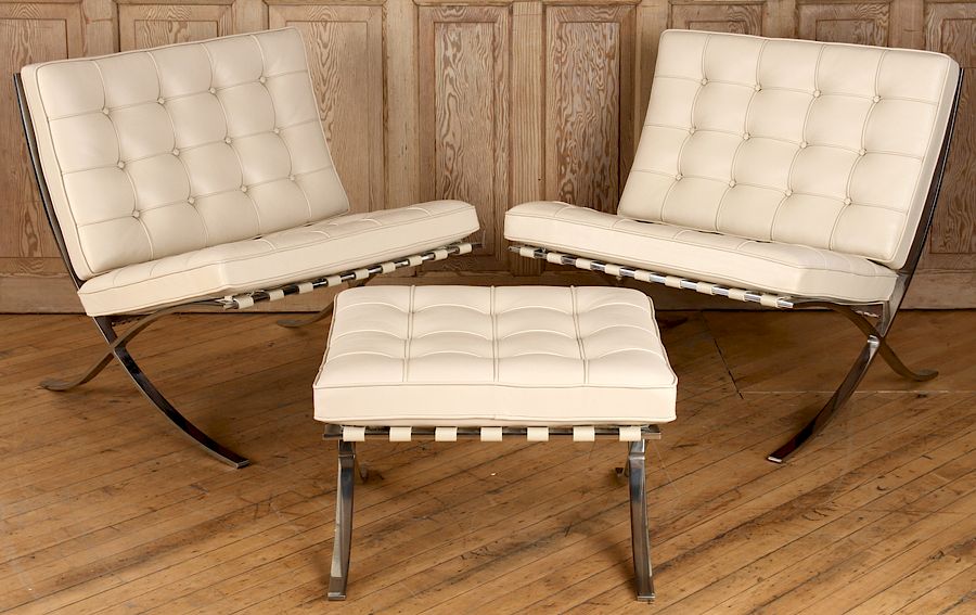 Appraisal: PAIR CHROME BARCELONA CHAIRS OTTOMAN BY KNOLL A pair of