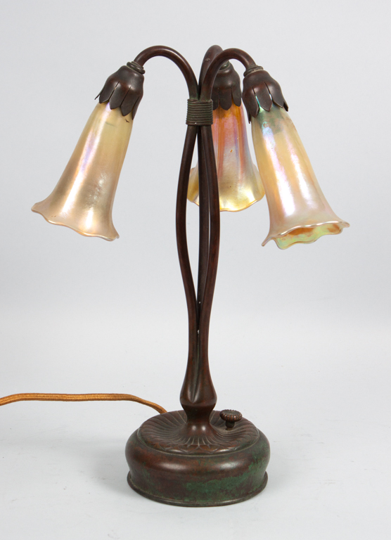 Appraisal: Tiffany bronze lily lamp first quarter- th century floral-form base