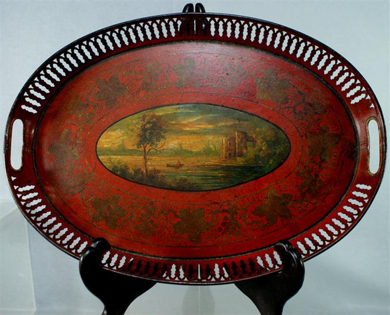 Appraisal: Oval painted tole tray center reserve with lake landscape scene