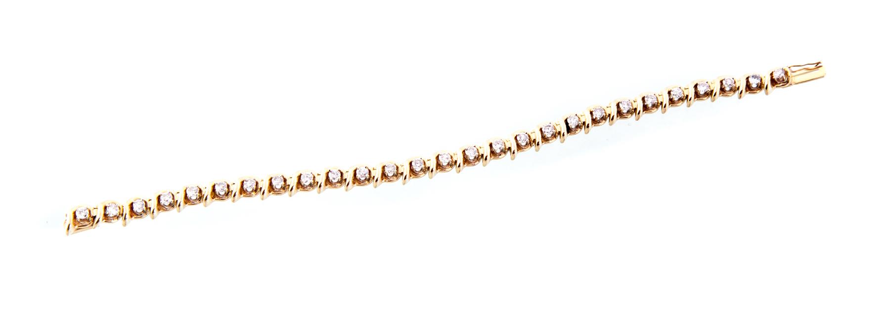 Appraisal: DIAMOND TENNIS BRACELET American th century K yellow gold S