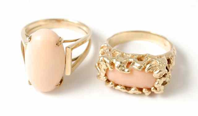 Appraisal: TWO PINK CORAL AND YELLOW GOLD RINGS both k yellow