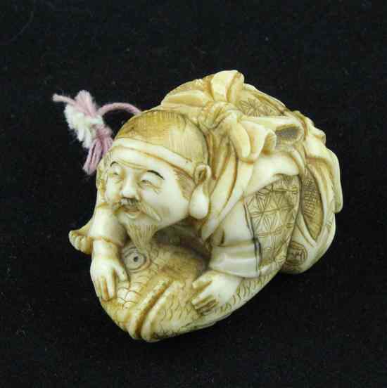 Appraisal: A Meiji period ivory netsuke carved as Kinko upon a