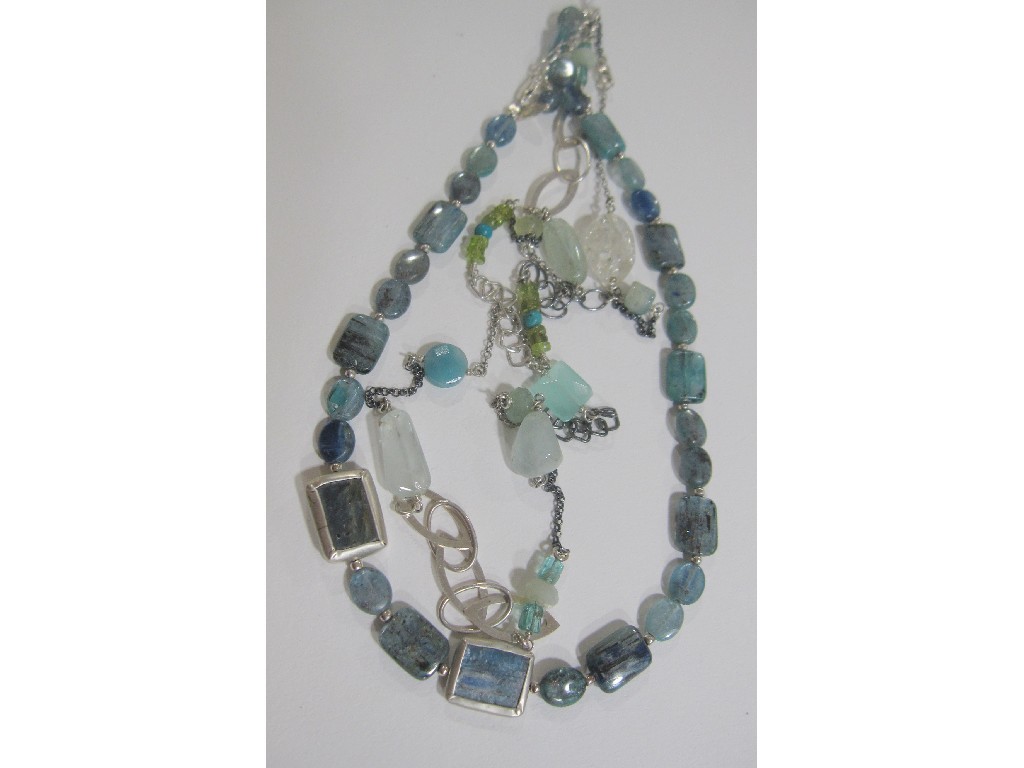 Appraisal: Lot comprising long silver necklace with opalescent glass bead spacers