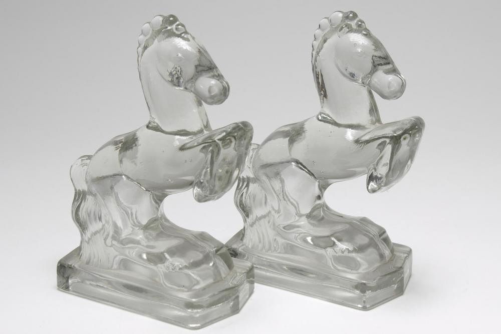 Appraisal: Vintage Horse Glass Bookends Pair Vintage pressed glass Equestrian bookends