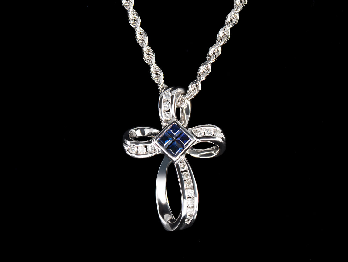 Appraisal: K DIAMOND AND SAPPHIRE CROSS PENDANT NECKLACE K white gold