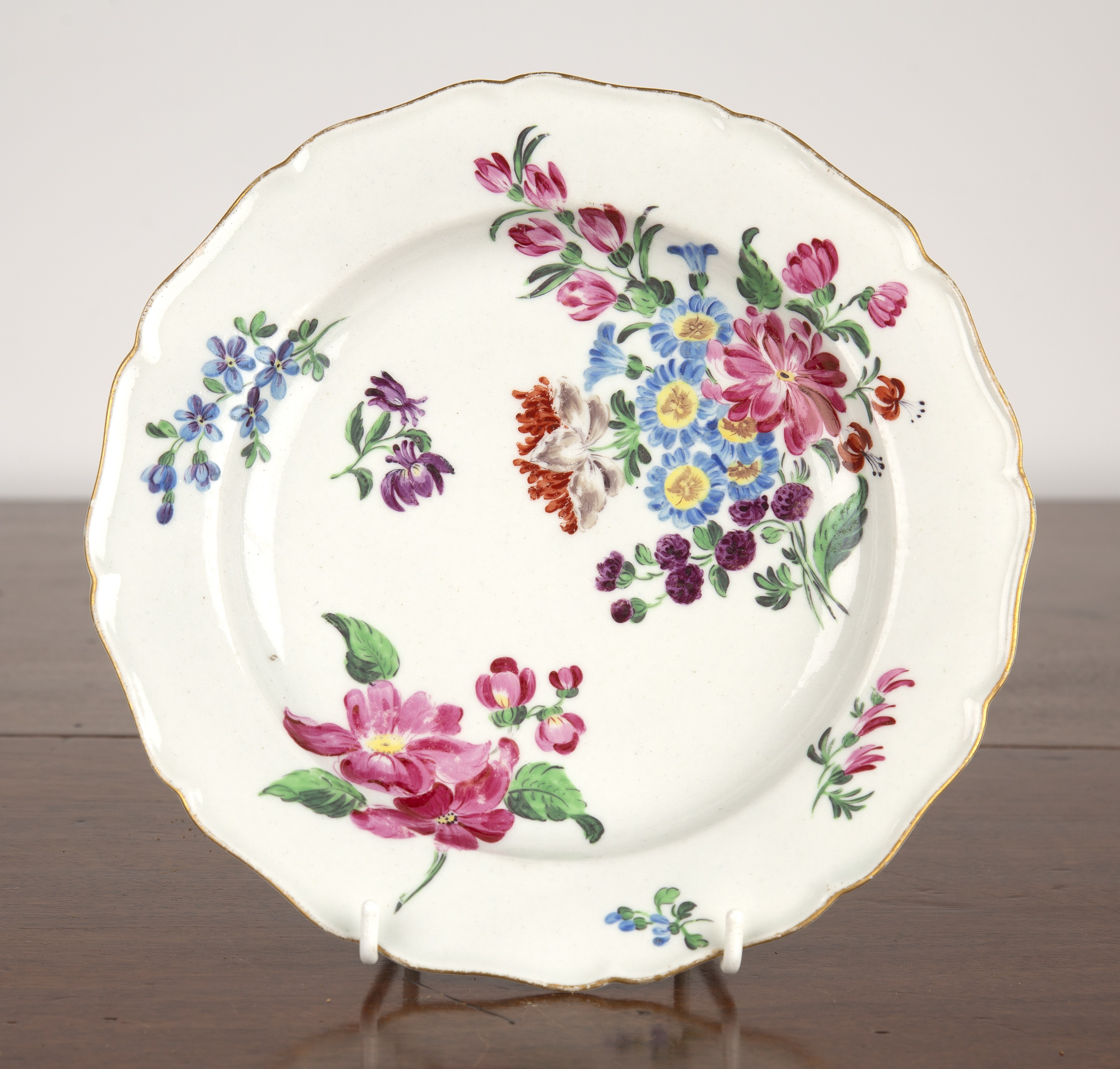 Appraisal: Porcelain plate probably Worcestercirca painted with sprays of flowers within