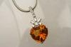 Appraisal: PENDANT - Platinum diamond and heart shaped citrine pendant stamped