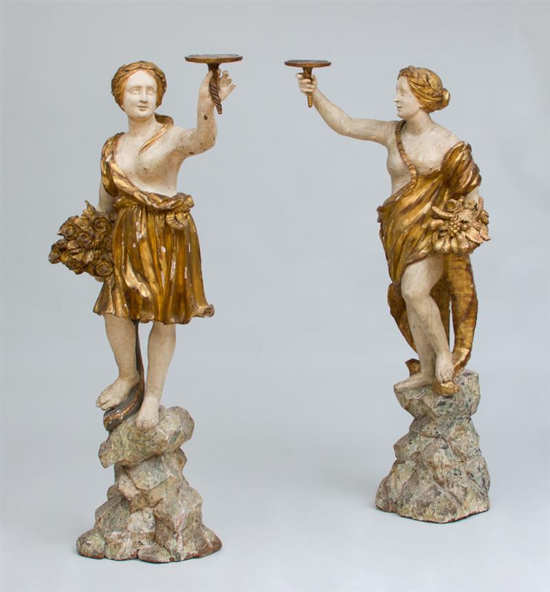 Appraisal: PAIR OF ITALIAN BAROQUE PARCEL-GILT AND CREAM-PAINTED FIGURES Approx ft