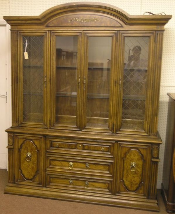 Appraisal: An American walnut and oak dining room suite comprising oval