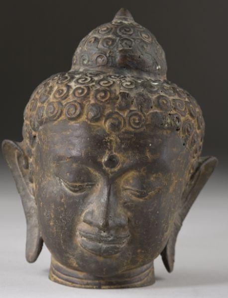 Appraisal: Southeast Asian Bronze Buddha Head hollow cast form with numerous