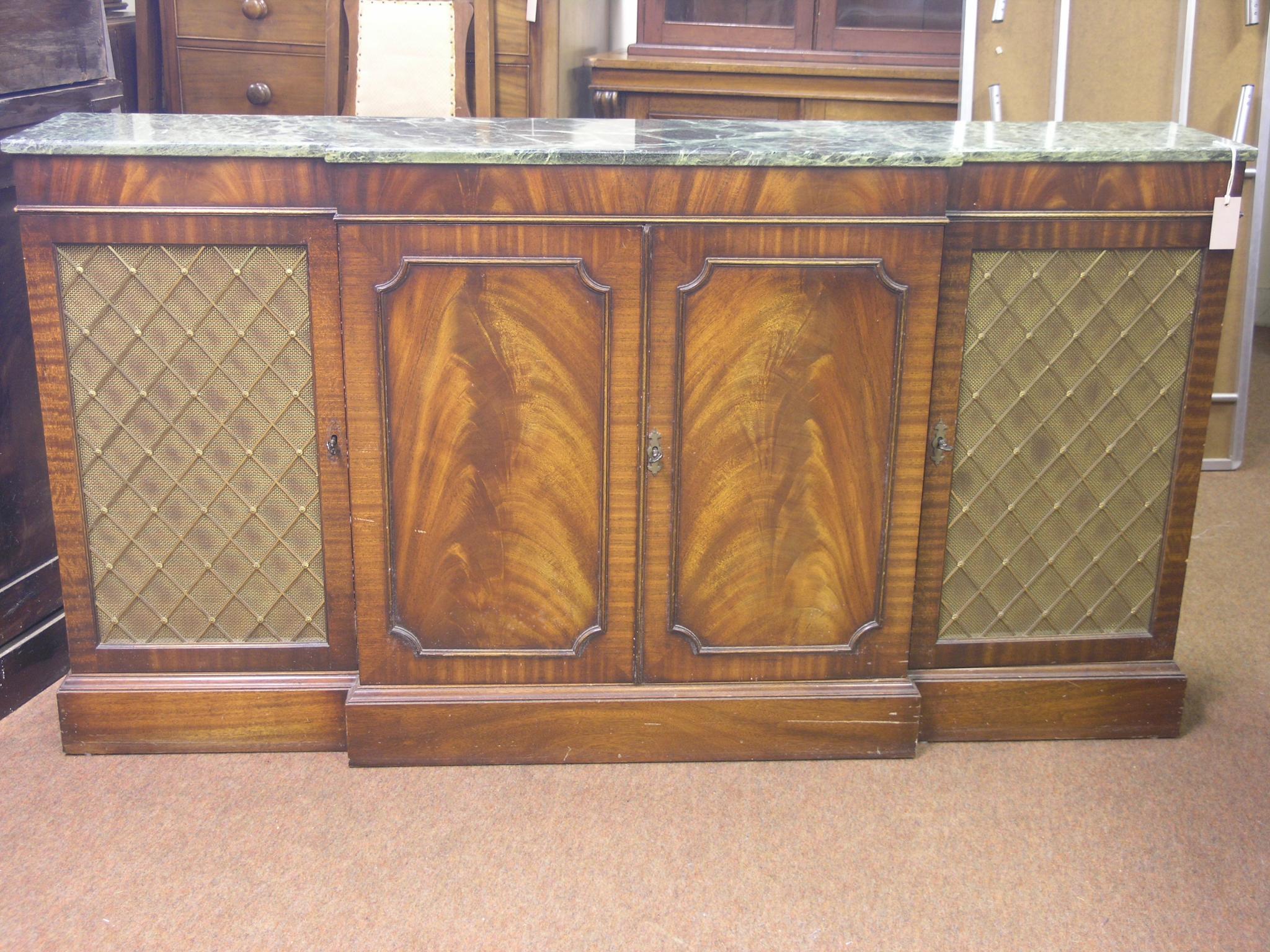 Appraisal: A Bevan Funnell Reprodux mahogany sideboard break-fronted with green marble