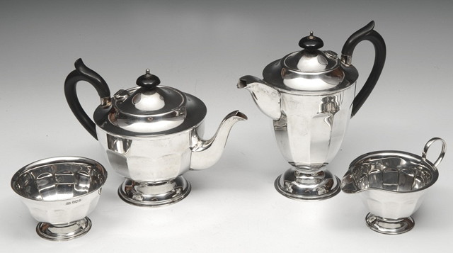 Appraisal: A SILVER FOUR PIECE TEA SERVICE teapot hot water jug