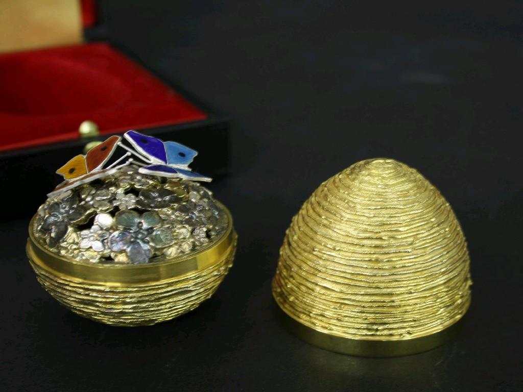 Appraisal: Stuart Devlin silver-gilt Easter egg limited edition with beehive style