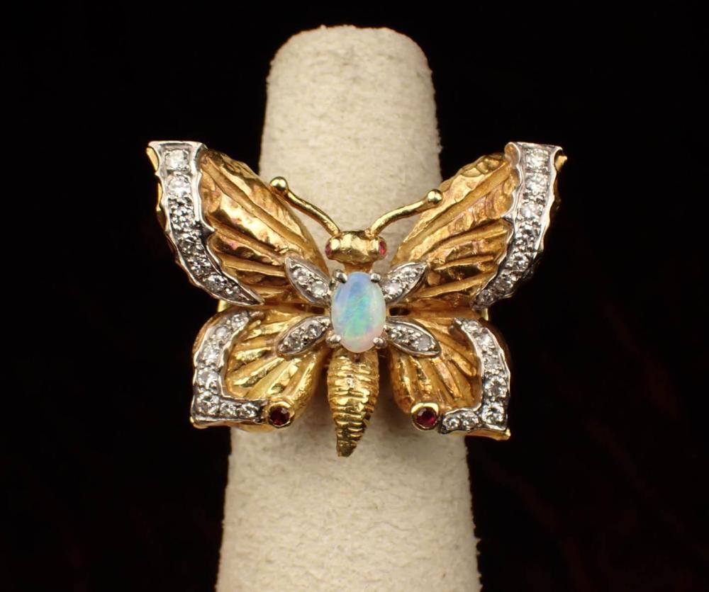 Appraisal: OPAL DIAMOND RUBY AND EIGHTEEN KARAT GOLD RING The large