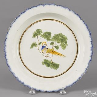 Appraisal: Pearlware blue feather edge charger th c with peafowl decoration