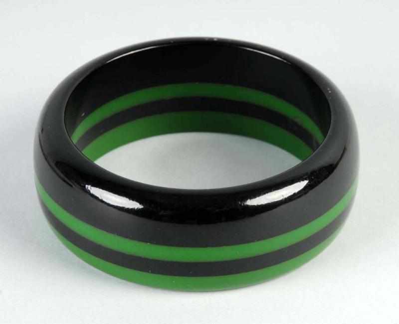 Appraisal: Bakelite Green Black Striped Bangle Description Thick bracelet with no