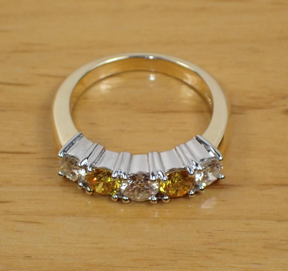 Appraisal: YELLOW AND WHITE DIAMOND TWO-TONE GOLD RING The k white