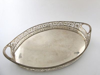 Appraisal: An Edwardian Scottish silver two handled gallery tray oval form