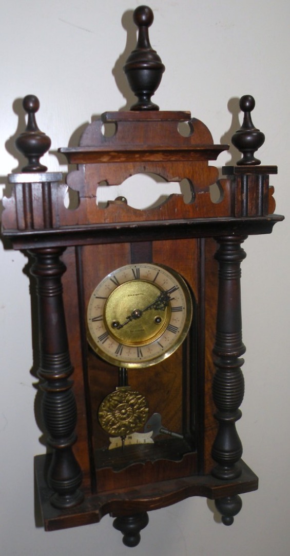 Appraisal: An early thC walnut cased Vienna wall clock the cm