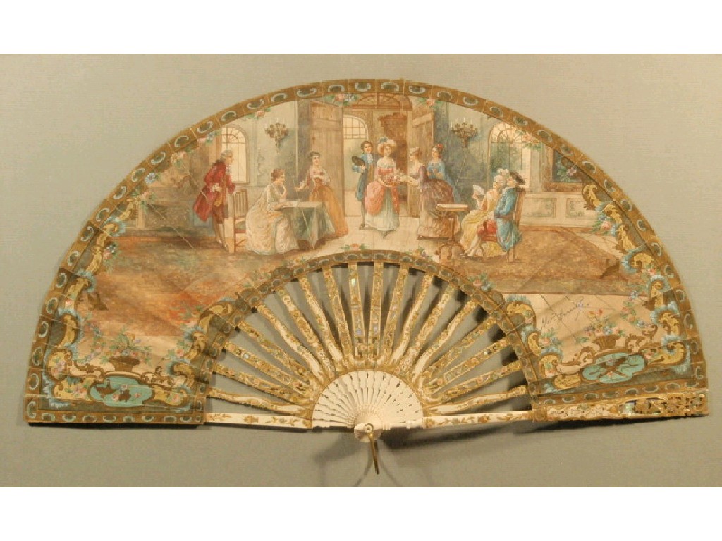 Appraisal: An thC hand painted fan depicting figures in an interior