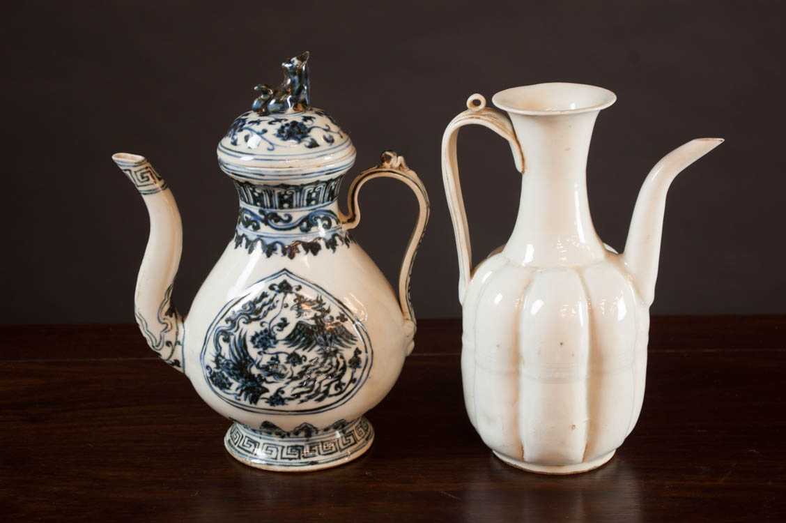 Appraisal: TWO CHINESE PORCELAIN EWERS the first Song style ewer with