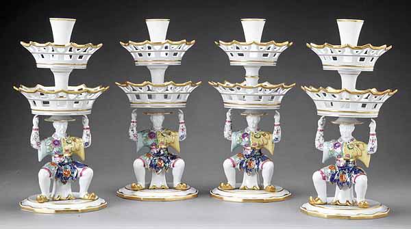 Appraisal: Four Mottahedeh Porcelain Tiered Tazzas each supported by a fanciful