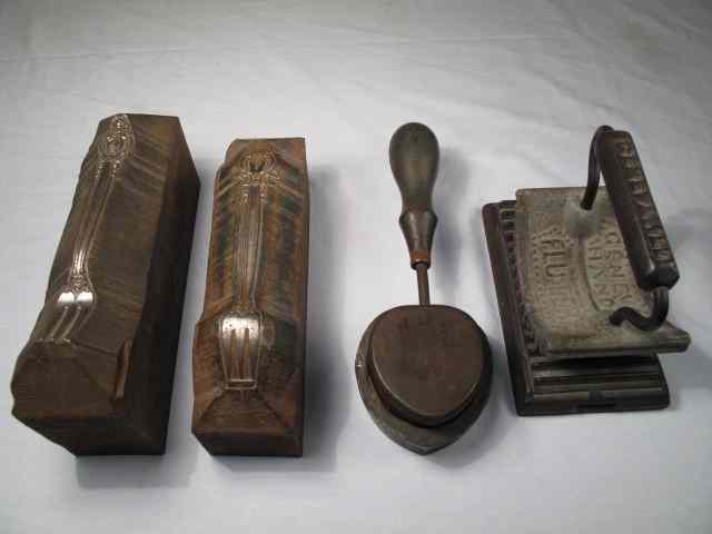 Appraisal: Group of antique cast iron items Includes Geneva hand fluter